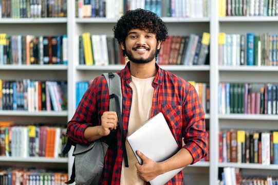 Student with earphones and study materials — BeMax Academy