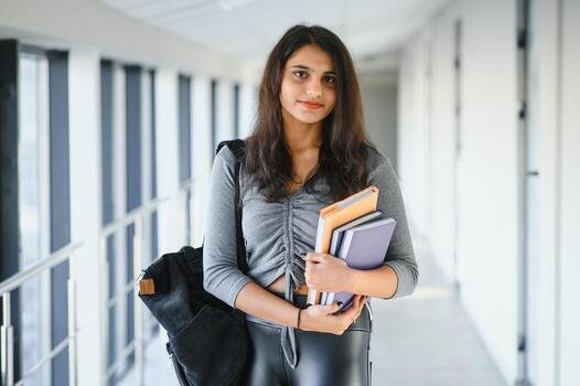 Student with earphones and study materials — BeMax Academy